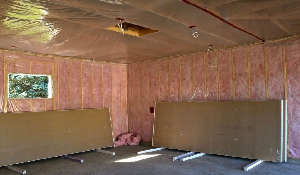 Finishing a newly constructed garage with insulation and sheet rocking