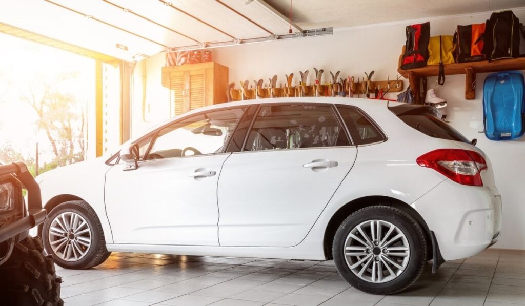 Home suburban countryside modern car and ATV double garage interior with wooden shelf 