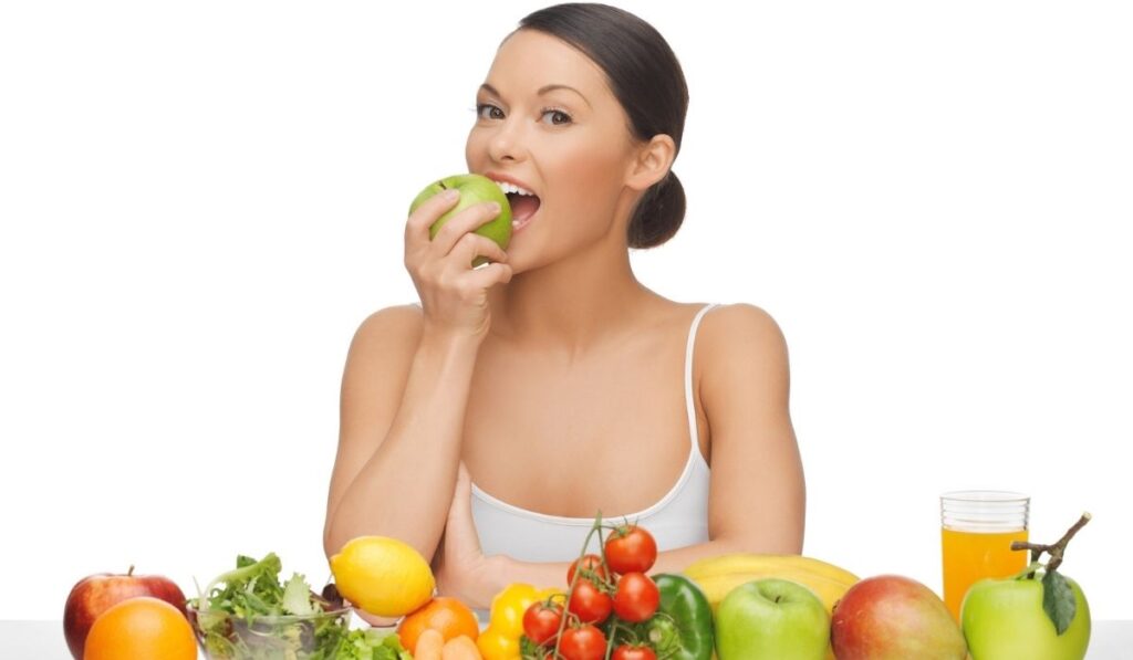 Woman with fruits and vegetables