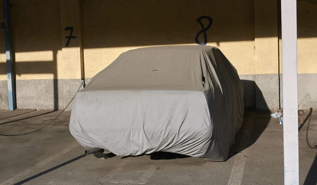 Covered car in a garage