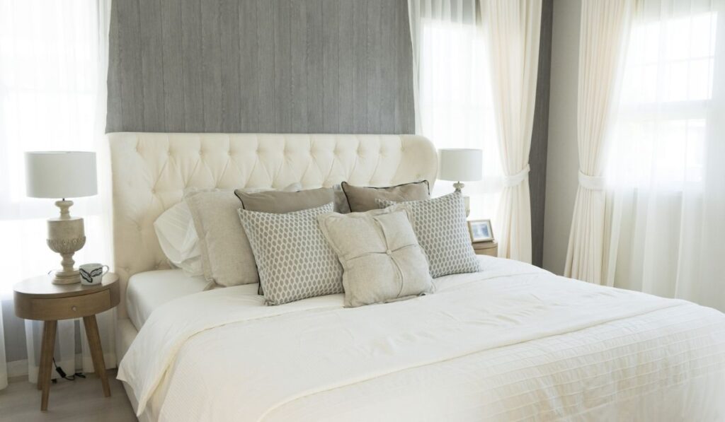 White pillows setting on English country style bedroom 