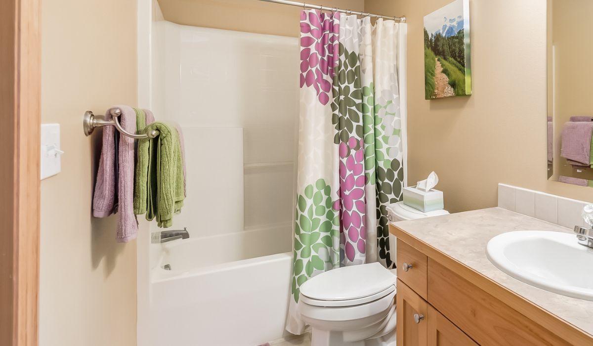 Bright Bathroom with Floral Shower Curtain