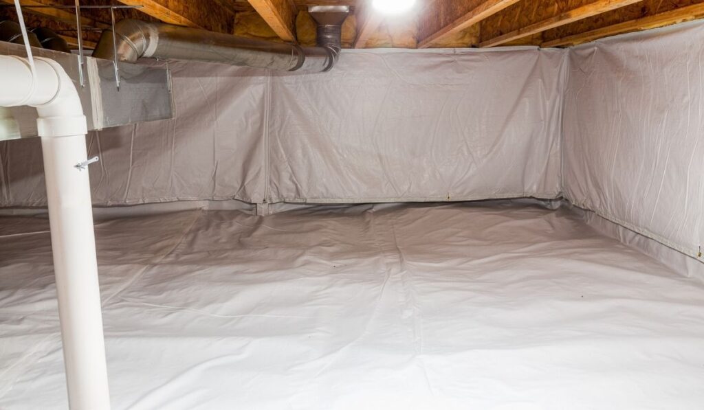 Crawl space fully encapsulated with thermoregulatory blankets and dimple board