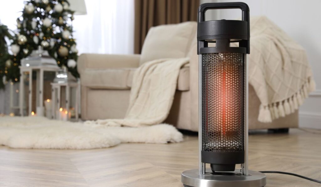 Modern electric heater on floor at home 