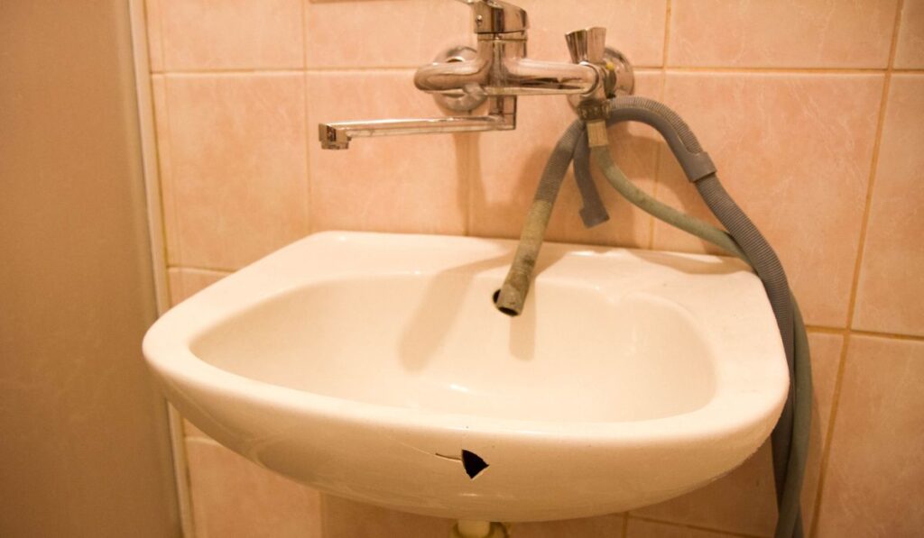 replace cracked bathroom sink