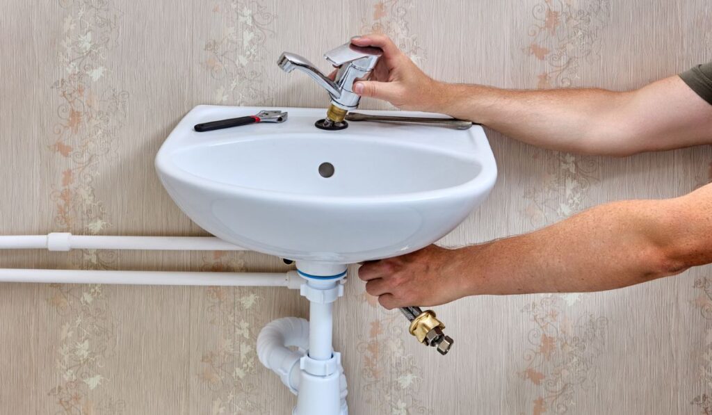 Installing single lever faucet on washroom sink