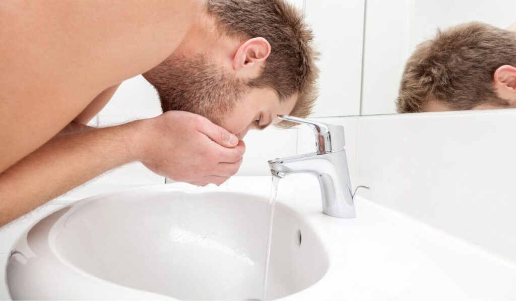 Man Drinks Tap Water 1024x597 